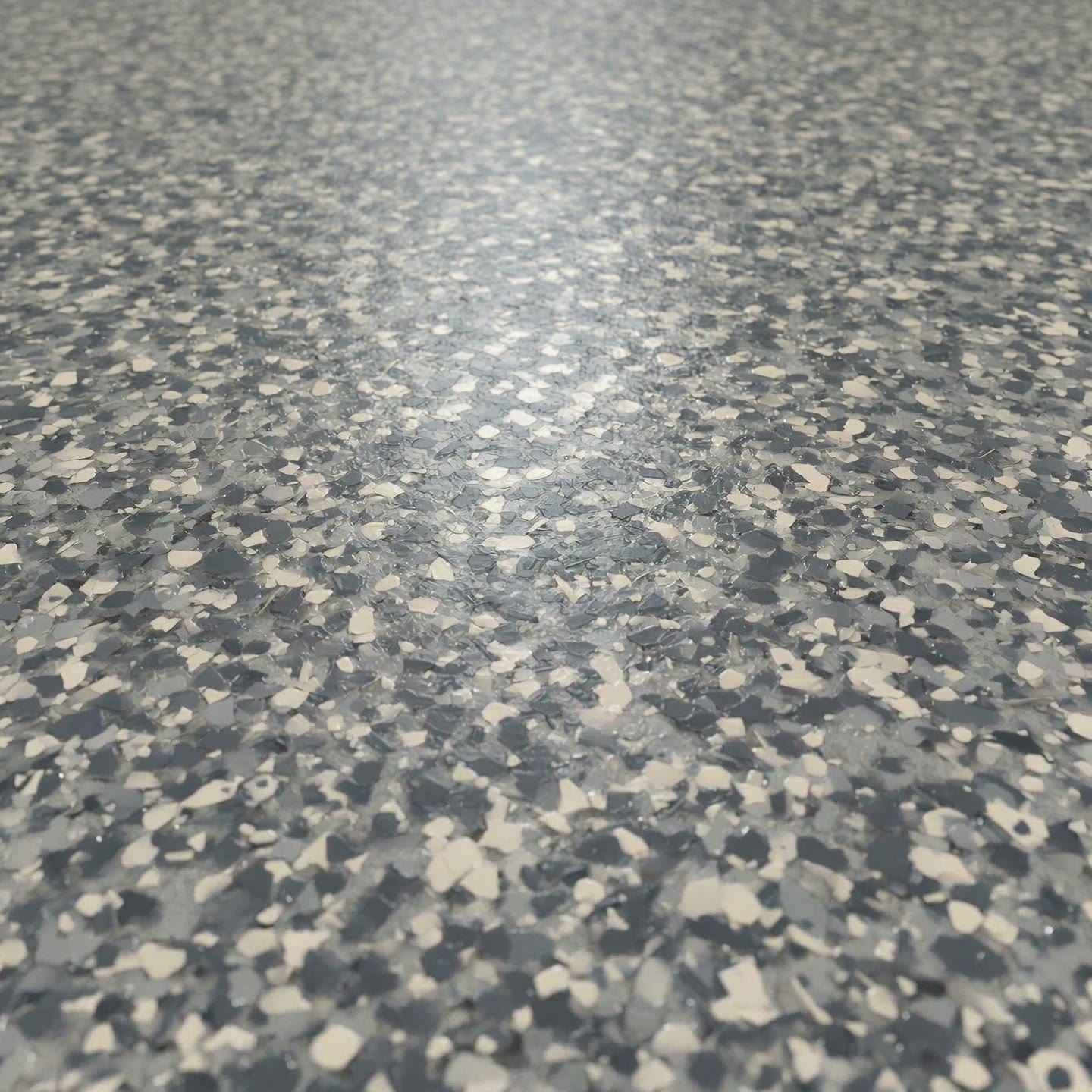 Macro of grey and cream vinyl flakes under a clear topcoat.